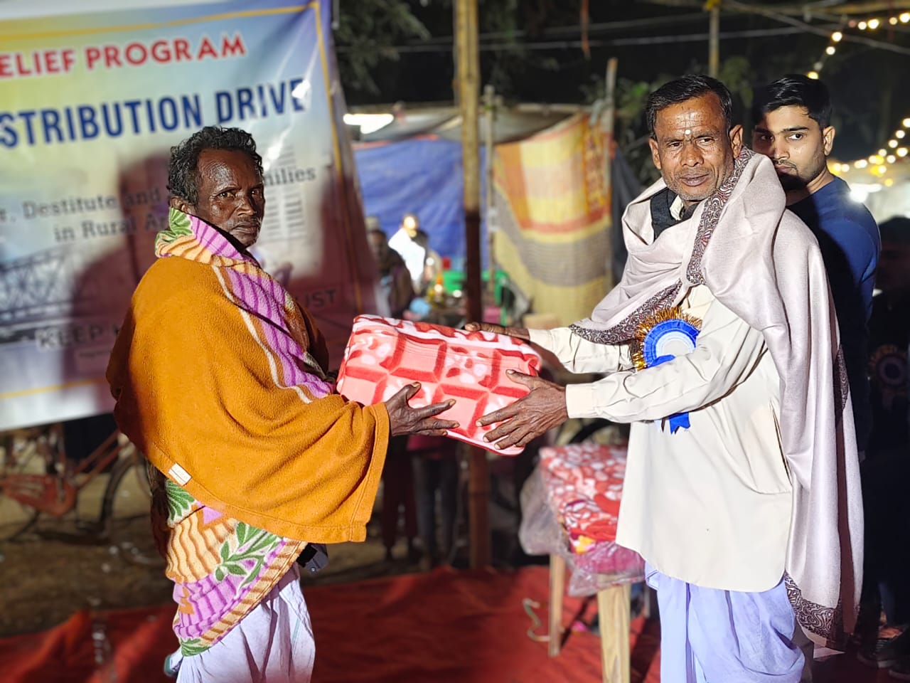 blanket distribution drive for members of the Adivasi (Tribal)